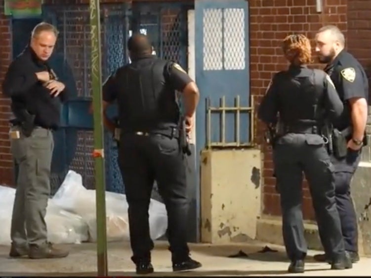 Investigators outside of the Divino Nino daycare centre in the Bronx