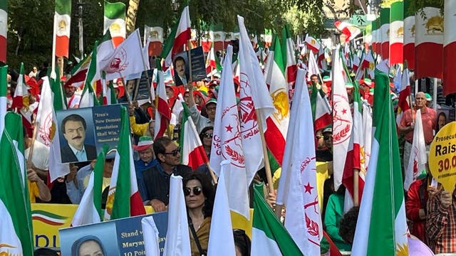 <p>Protesters hold Iranian flags and call for the arrest of Iran’s president outside the United Nations General Assembly in New York</p>