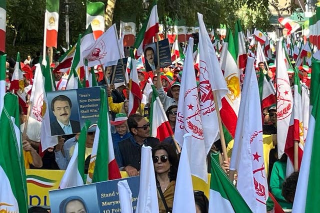 <p>Protesters hold Iranian flags and call for the arrest of Iran’s president outside the United Nations General Assembly in New York</p>