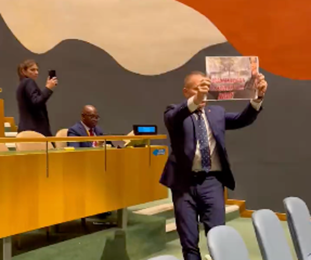 <p>Israel’s ambassador to the United Nations Gilad Erdan holds up a protest sign during a 19 September, 2023, speech at the General Assembly by Iranian president Ebrahim Raisi</p>