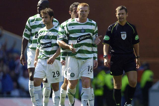 Celtic’s Neil Lennon, centre, was restrained by his team-mates after being sent off by referee Stuart Dougal in the 2005 Old Firm derby at Ibrox (Steve Welsh/PA)
