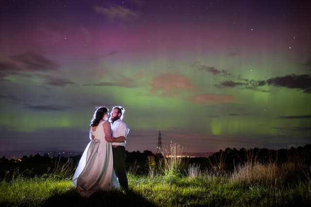 <p>Rebecca and Chris on their wedding day in front of the Northern Lights. </p>