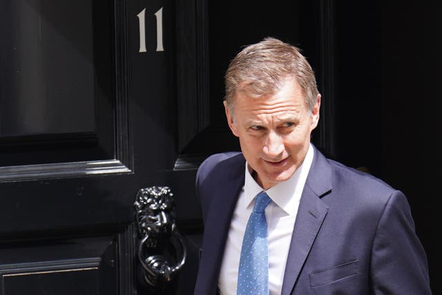 Chancellor Jeremy Hunt said the Government’s plan to halve inflation ‘is working – plain and simple’ (James Manning/PA)