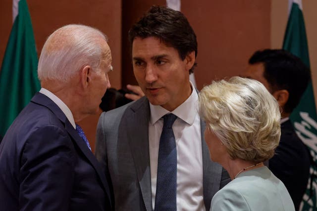<p>US president Joe Biden (left), Canada’s prime minister Justin Trudeau (centre) and European Commission president Ursula von der Leyen speak with each other at G20 Summit in Delhi</p>