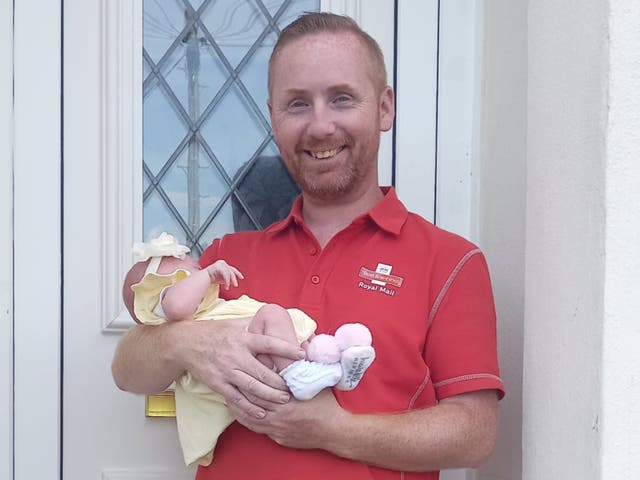 <p>Scott with his daughter Taymar May in Argoed, Wales</p>