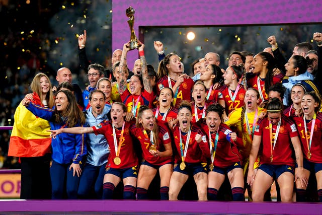 Spain players celebrate after winning the Women’s World Cup (Zac Goodwin/PA)
