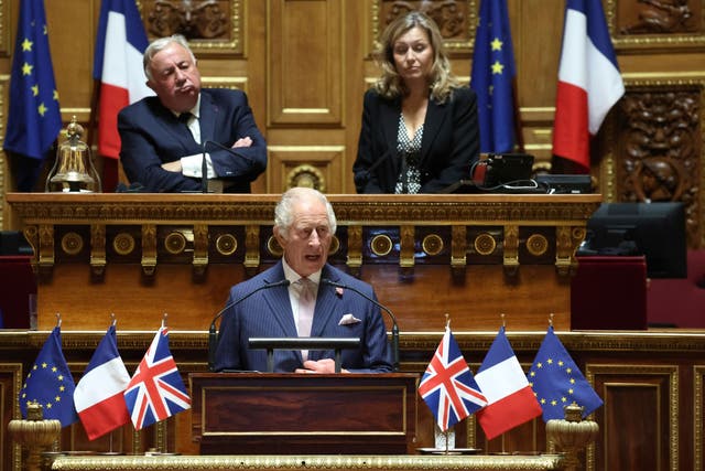 The King addresses French legislators from both the upper and the lower house of parliament at the French Senate in Paris ( Emmanuel Dunand, Pool via AP)