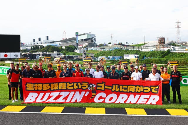 <p>Sebastian Vettel gathered drivers and teams together at Suzuka on Thursday </p>