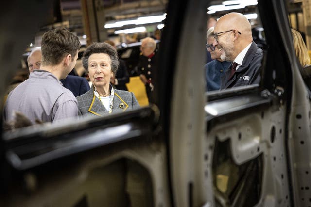 Anne meets employees during a tour of the Jaguar Land Rover factory in Halewood, Liverpool (James Speakman/PA)