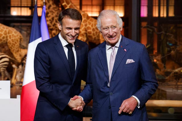 <p>French President Emmanuel Macron shakes hands with Britain's King Charles III during their visit to the Museum of Natural History</p>