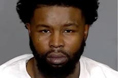 Girlfriend of Indiana fugitive arrested as he remains on run after being released from prison by mistake