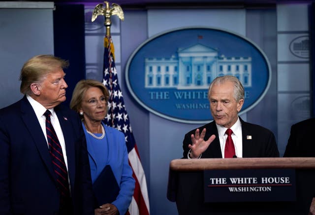 <p> White House Trade and Manufacturing Policy Director Peter Navarro speaks as U.S. President Donald Trump and Secretary of Education Betsy DeVos during a briefing on the coronavirus pandemic in the press briefing room of the White House on March 27, 2020 in Washington</p>