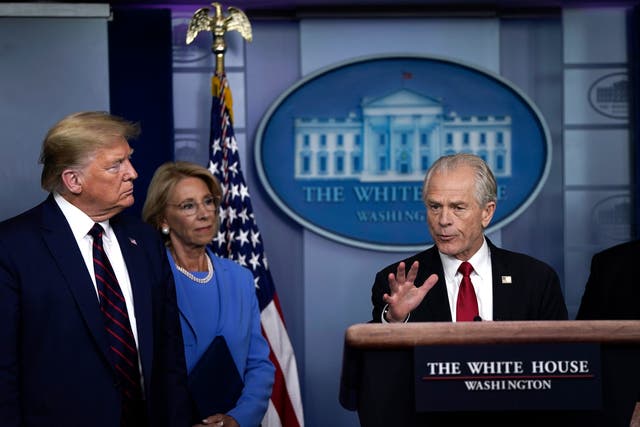 <p> White House Trade and Manufacturing Policy Director Peter Navarro speaks as U.S. President Donald Trump and Secretary of Education Betsy DeVos during a briefing on the coronavirus pandemic in the press briefing room of the White House on March 27, 2020 in Washington</p>