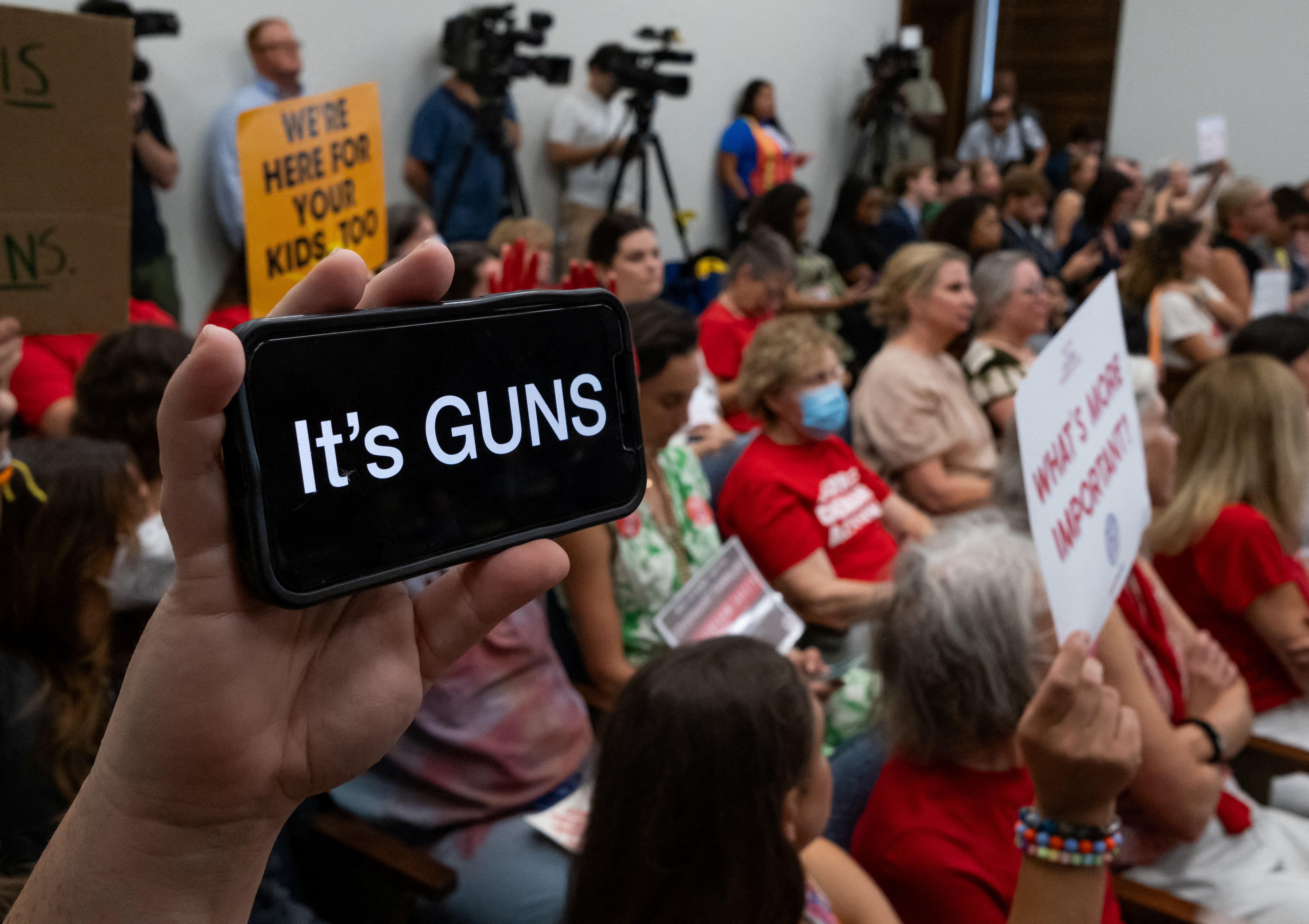 <p>A supporter of gun reform holds their  phone up during  special state legislative session on gun violence in Tennesseee in August. </p>