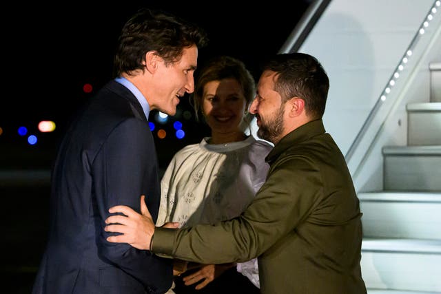 <p>Canadian prime minister Justin Trudeau, left, greets Ukrainian president Volodymyr Zelenskyy, right, as his wife Olena Zelenska looks on as they arrive at Ottawa Macdonald-Cartier International Airport in Ottawa, Ontario, on Thursday</p>