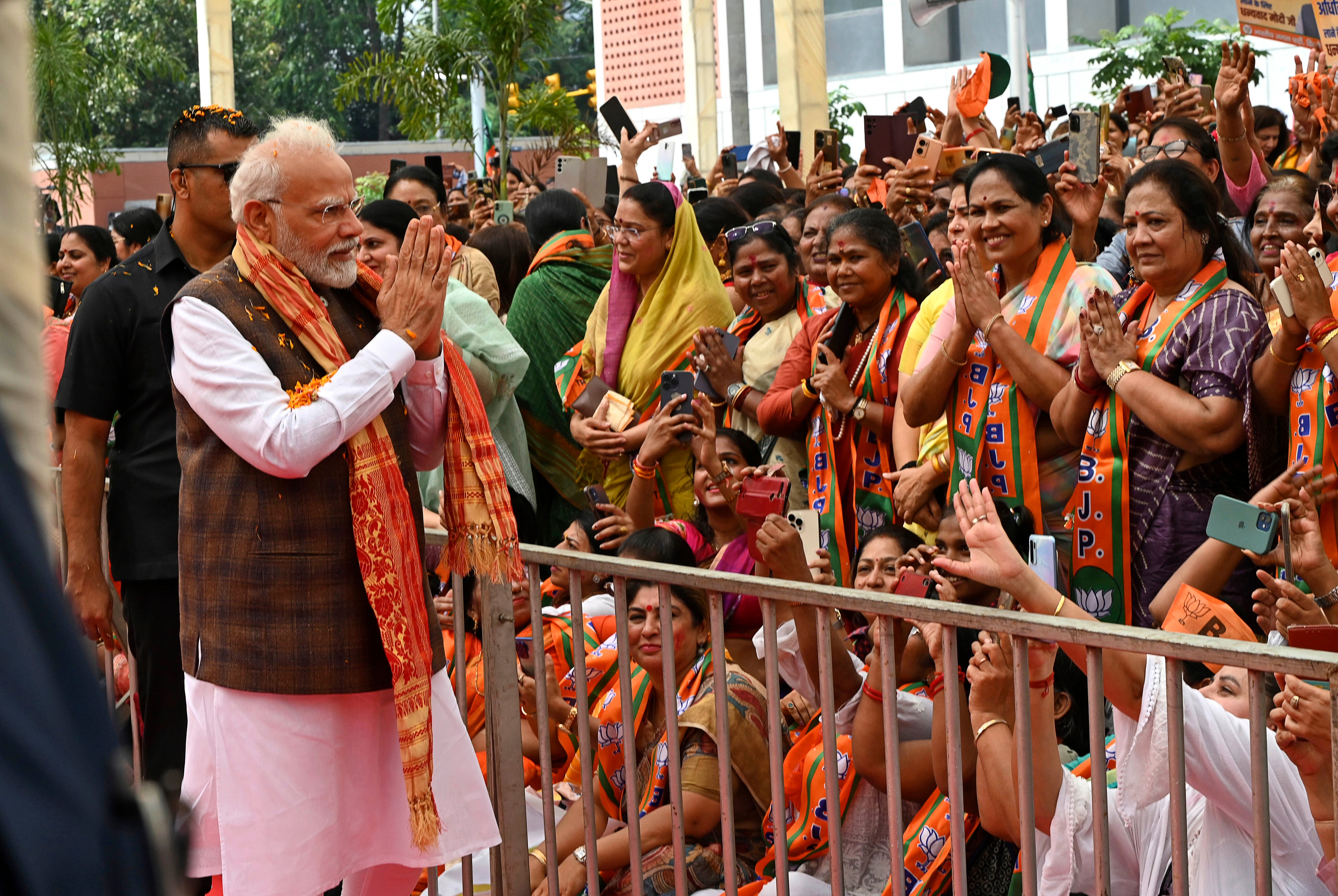 Prime minister Narendra Modi being felicitated by women at the Bharatiya Janata Party (BJP) headquarters in New Delhi, India