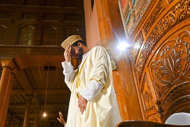 <p>Separatist leader Mirwaiz Umar Farooq, released after four years of house arrest, weeps before delivering the Friday sermon at Jamia Masjid in downtown Srinagar</p>