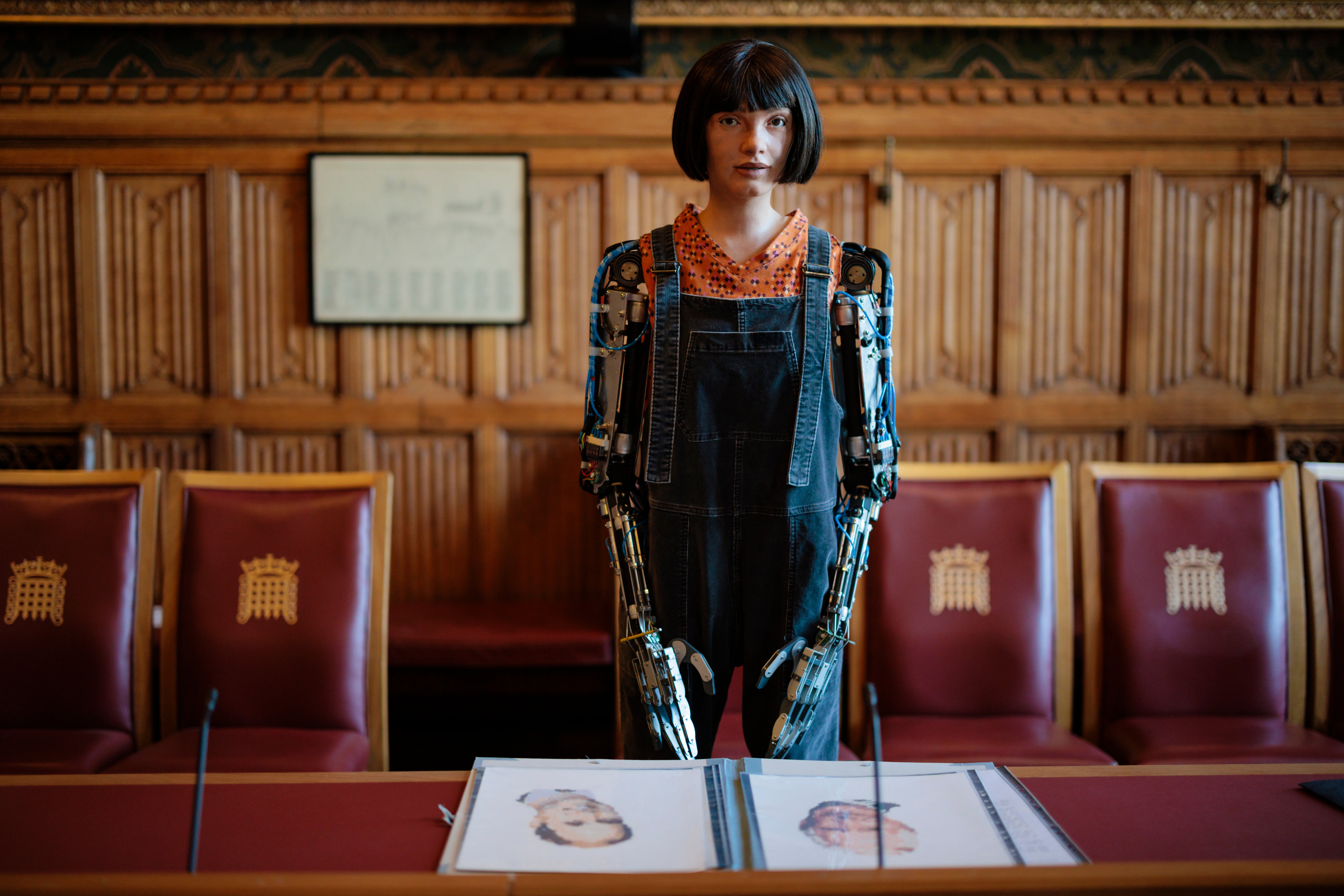 Ai-Da Robot, the world’s first ultra-realistic humanoid robot artist, appears at a photo call in a committee room in the House of Lords in October 2022