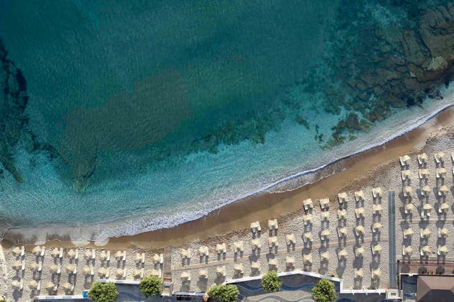 <p>Creta Maris resort opens up onto a pebble and sand beach </p>