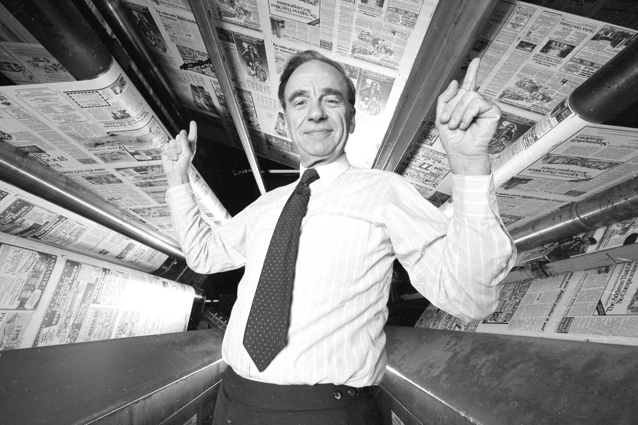 Billionaire newspaper magnate Rupert Murdoch watches his presses roll, in 1985