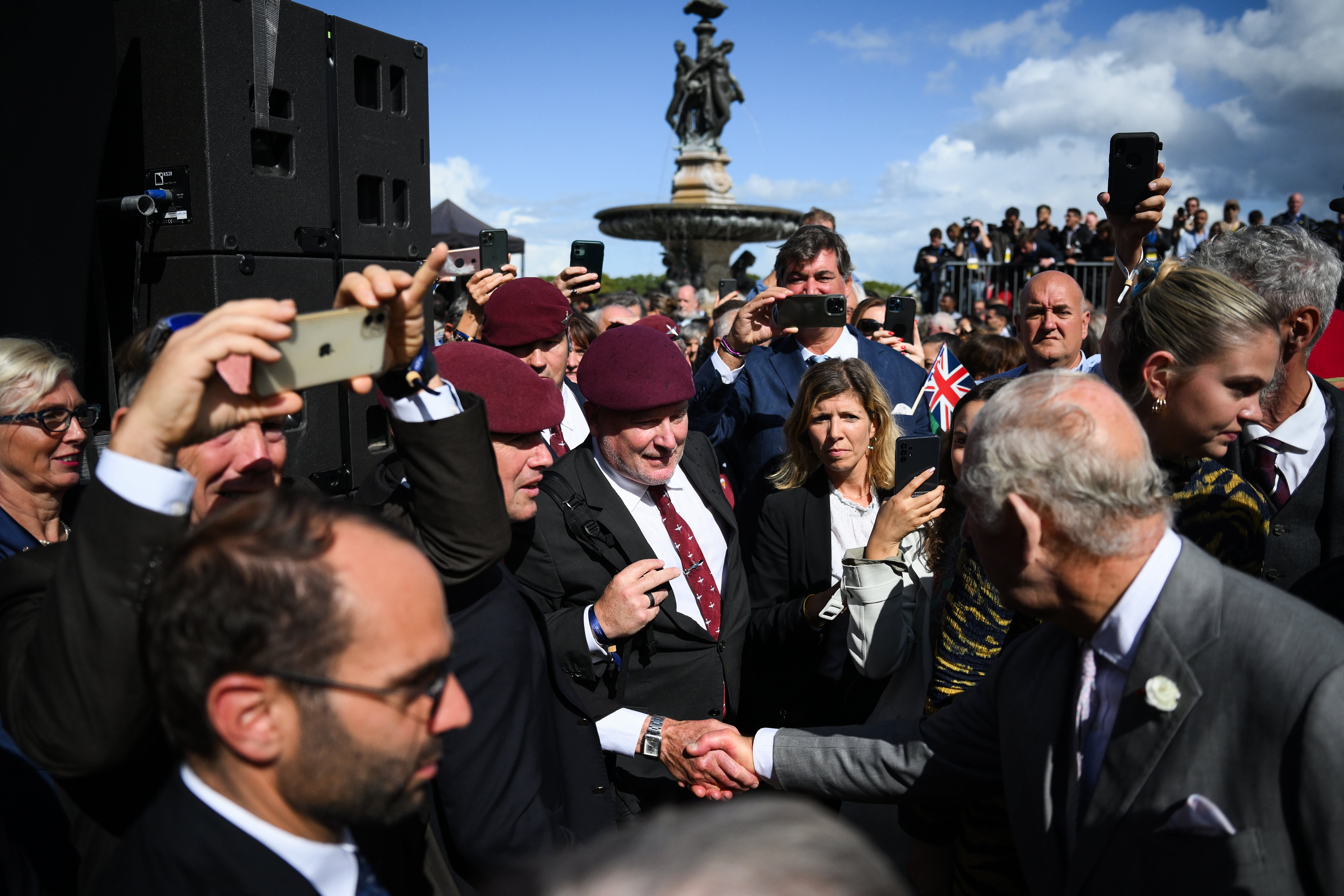 Charles greeting British veterans during a visit to Bordeaux