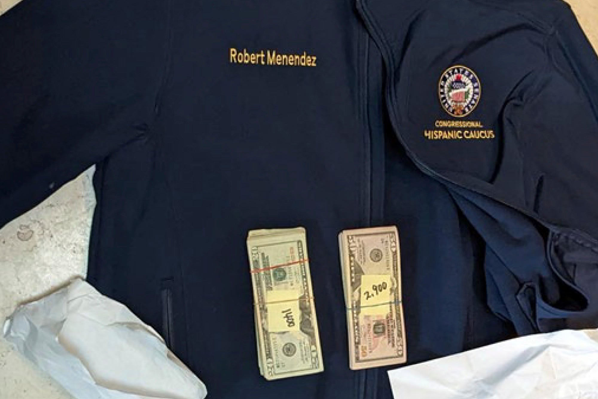 A jacket bearing Senator Menendez's name, along with cash found inside the jacket during a search by federal agents