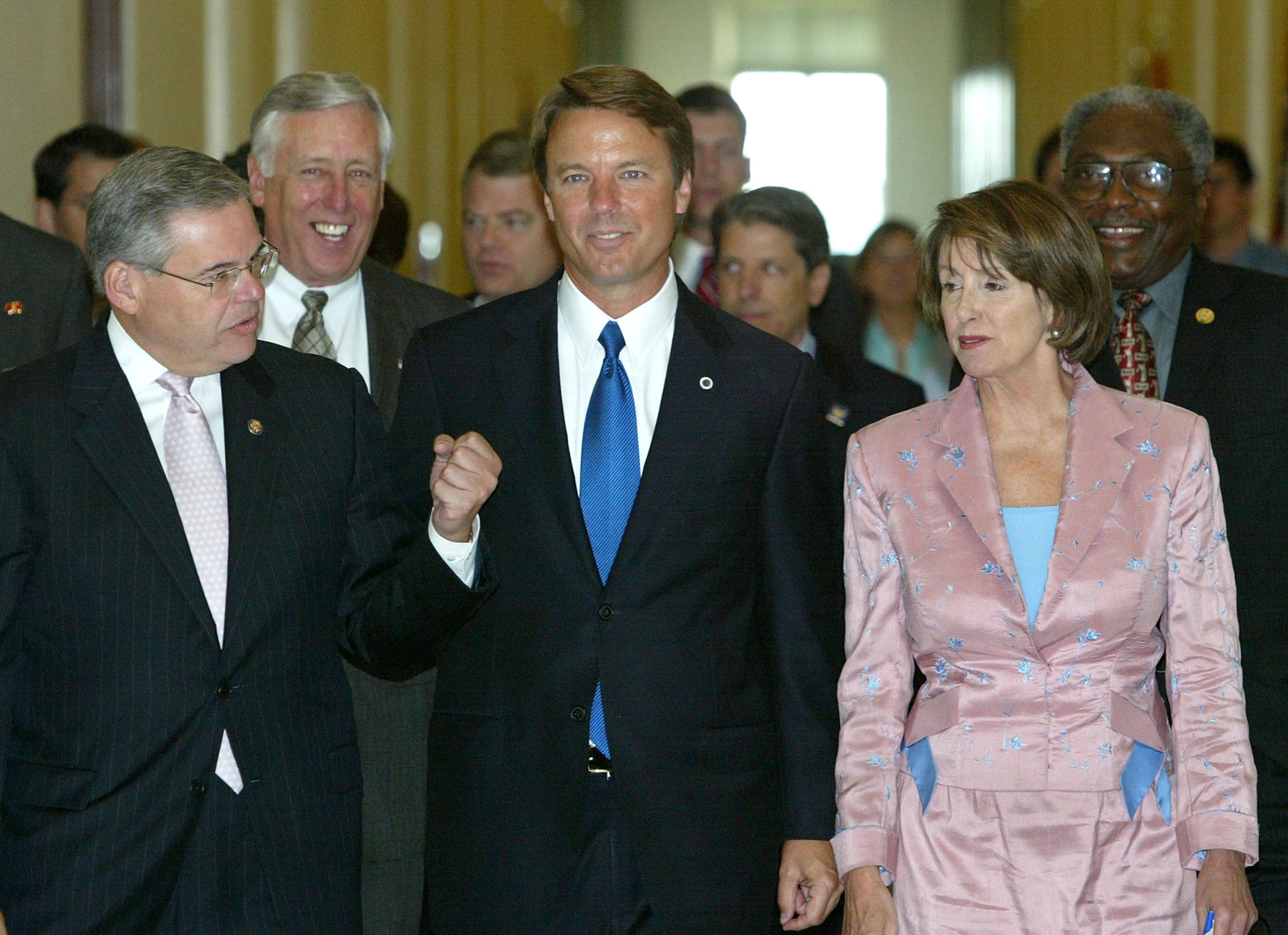 Then House Rep Menendez walks with vice presidential candidate and North Carolina Senator John Edwards and then-House Minority Leader Nancy Pelosi in July 2004