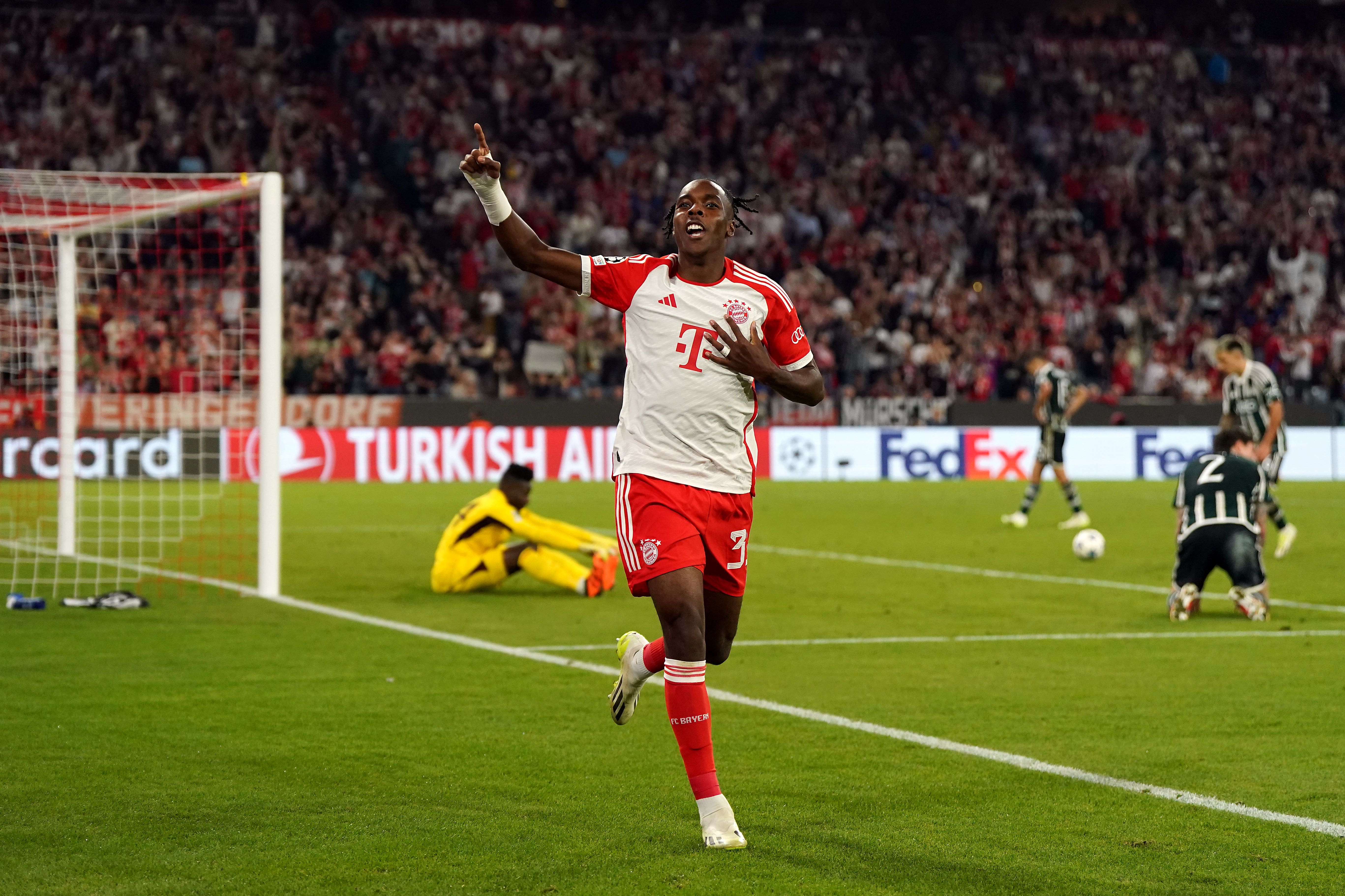 Bayern Munich’s Mathys Tel celebrates scoring the fourth goal against Manchester United (Nick Potts/PA)