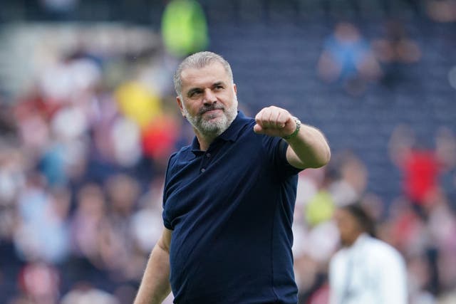 Ange Postecoglou has promised Tottenham fans they will take the game to Arsenal this weekend (Jonathan Brady/PA)