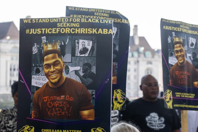 <p>Chris Kaba is remembered by his family and their supporters at New Scotland Yard on September 9</p>