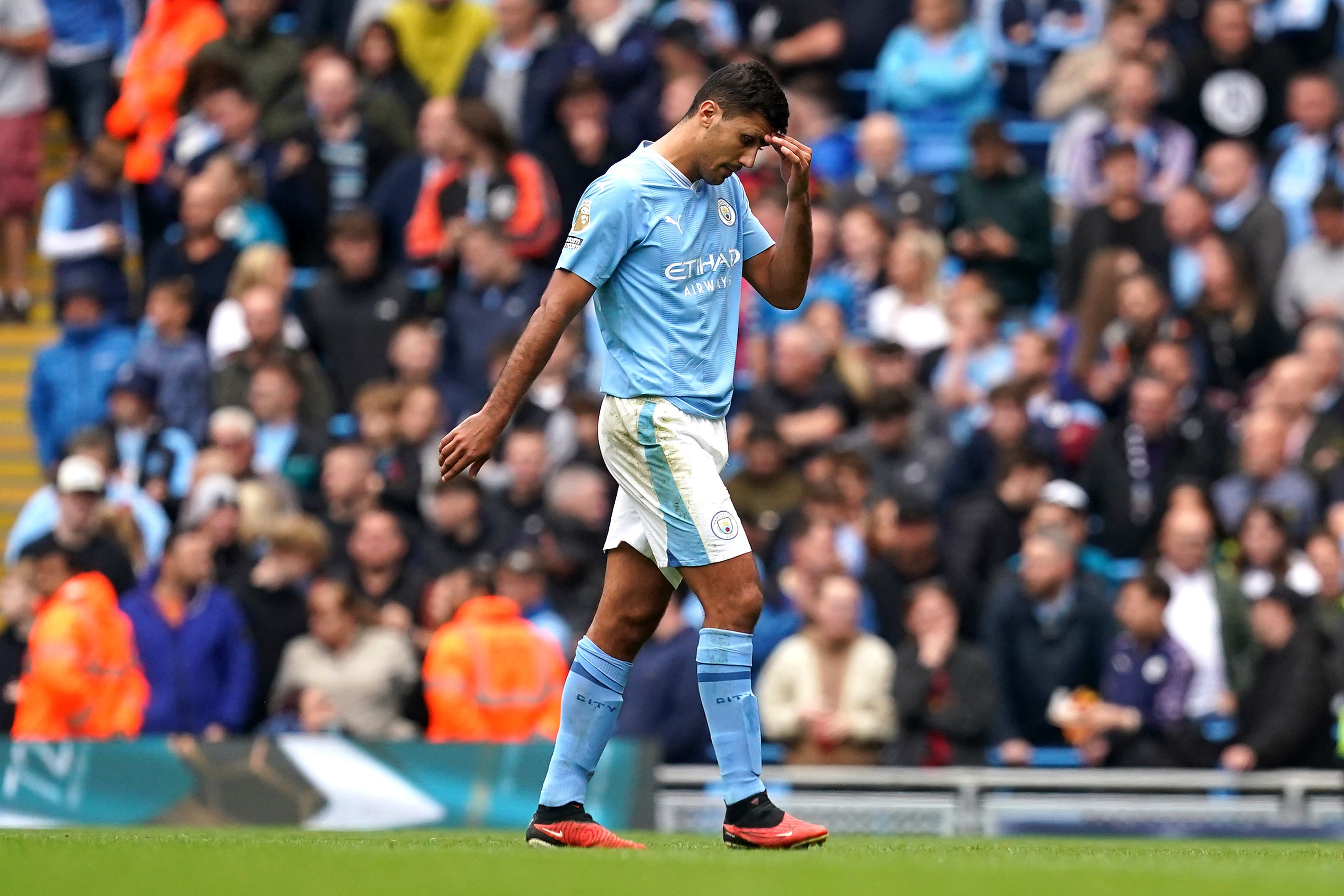 Manchester City’s Rodri looks dejected after being shown a red card for violent conduct against Nottingham Forest. (Martin Rickett/PA)