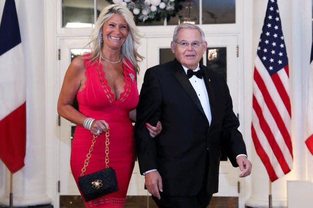 <p>Senator Bob Menendez (D-NJ) and his wife Nadine Arslanian Menendez arrive for a state dinner in honor of French President Emmanuel Macron at the White House in Washington on 1 December 2022</p>