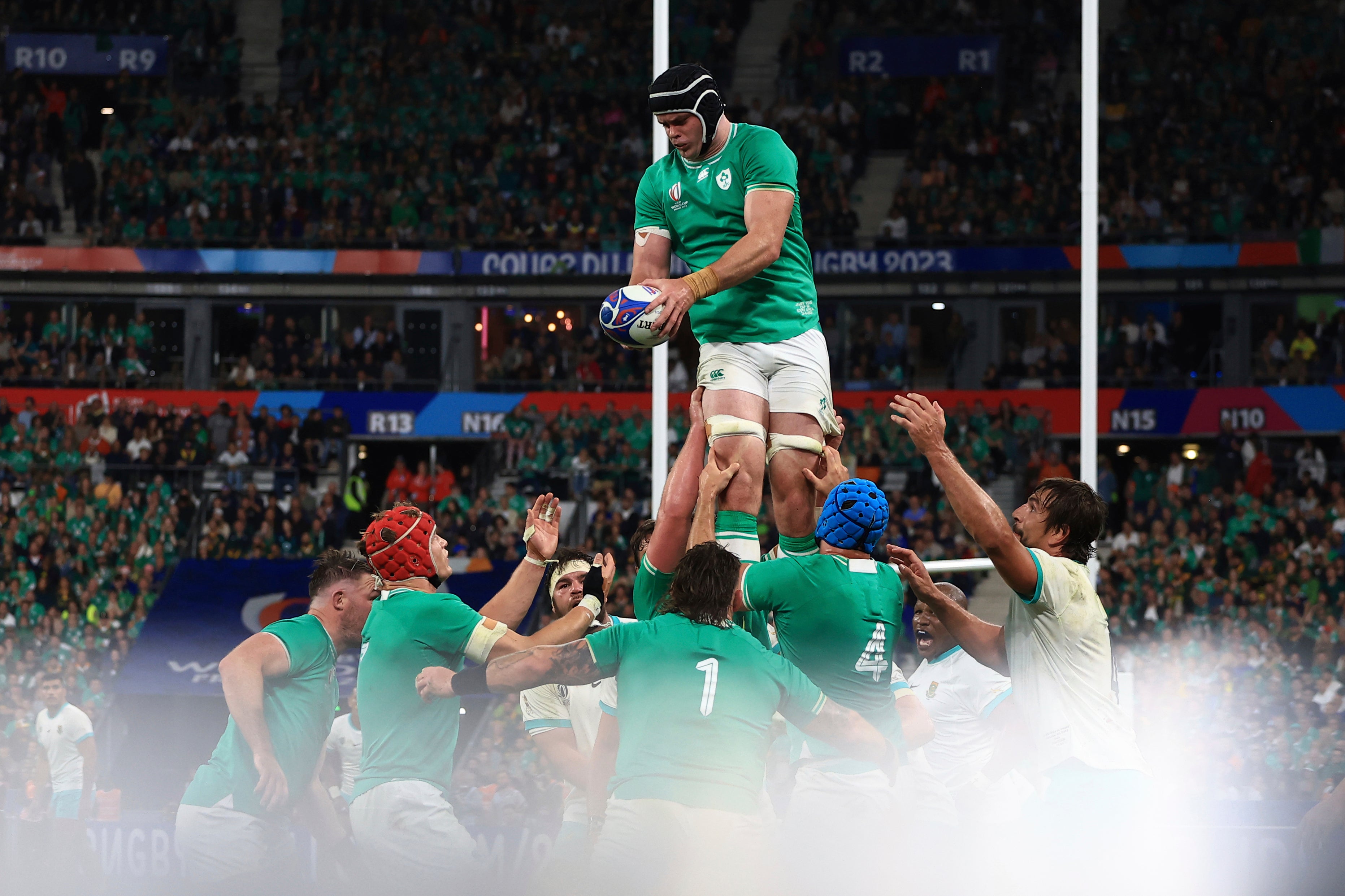 Ireland's James Ryan hands the ball down in a lineout