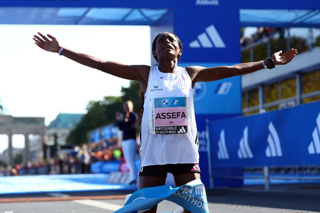 <p> Ethiopia’s Tigist Assefa celebrates after breaking the world record</p>
