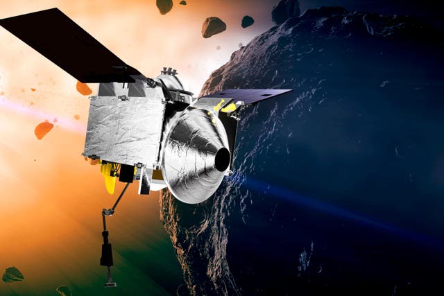 An illustration of the Osiris-Rex spacecraft at the asteroid Bennu (Conceptual Image Lab/Goddard Space Flight Center/NASA via AP)