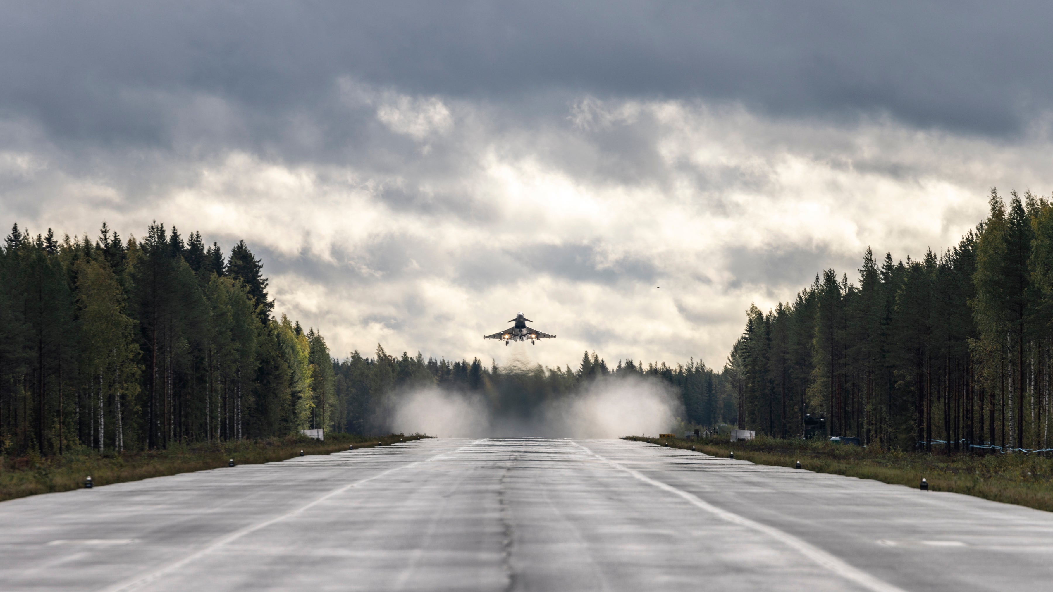 The road is usually used for normal traffic, but has been specially designated to serve as an emergency landing strip to sustain aircraft activity if required