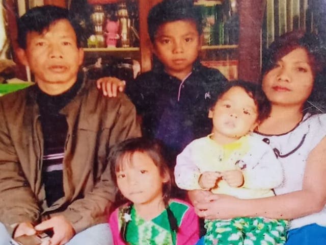 <p>Joshua Hangsing and his wife Meena with their son Tonsing (centre) and two other children</p>