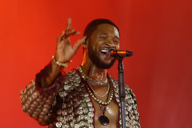 <p>Usher performing at the Global Citizen Festival in 2022</p>