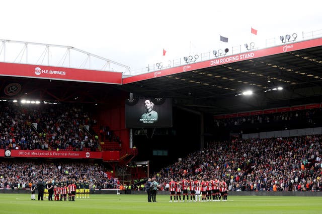 <p>The Blades entered the pitch wearing shirts with Maddy Cusack’s name and number on the back</p>