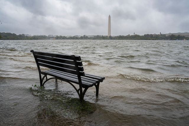 <p>The Tidal Basin in Washington overflows the banks with the rain from Tropical Storm Ophelia</p>