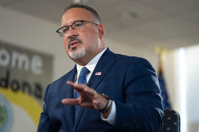 <p>Education Secretary Miguel Cardona speaks during an interview with The Associated Press </p>