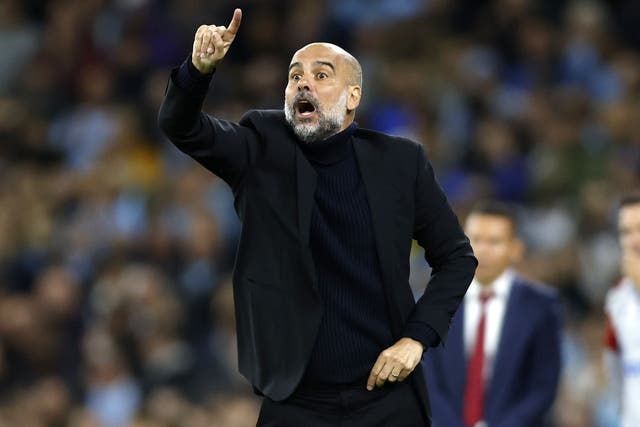 Pep Guardiola has joked that he could get his boots out (Nigel French/PA)