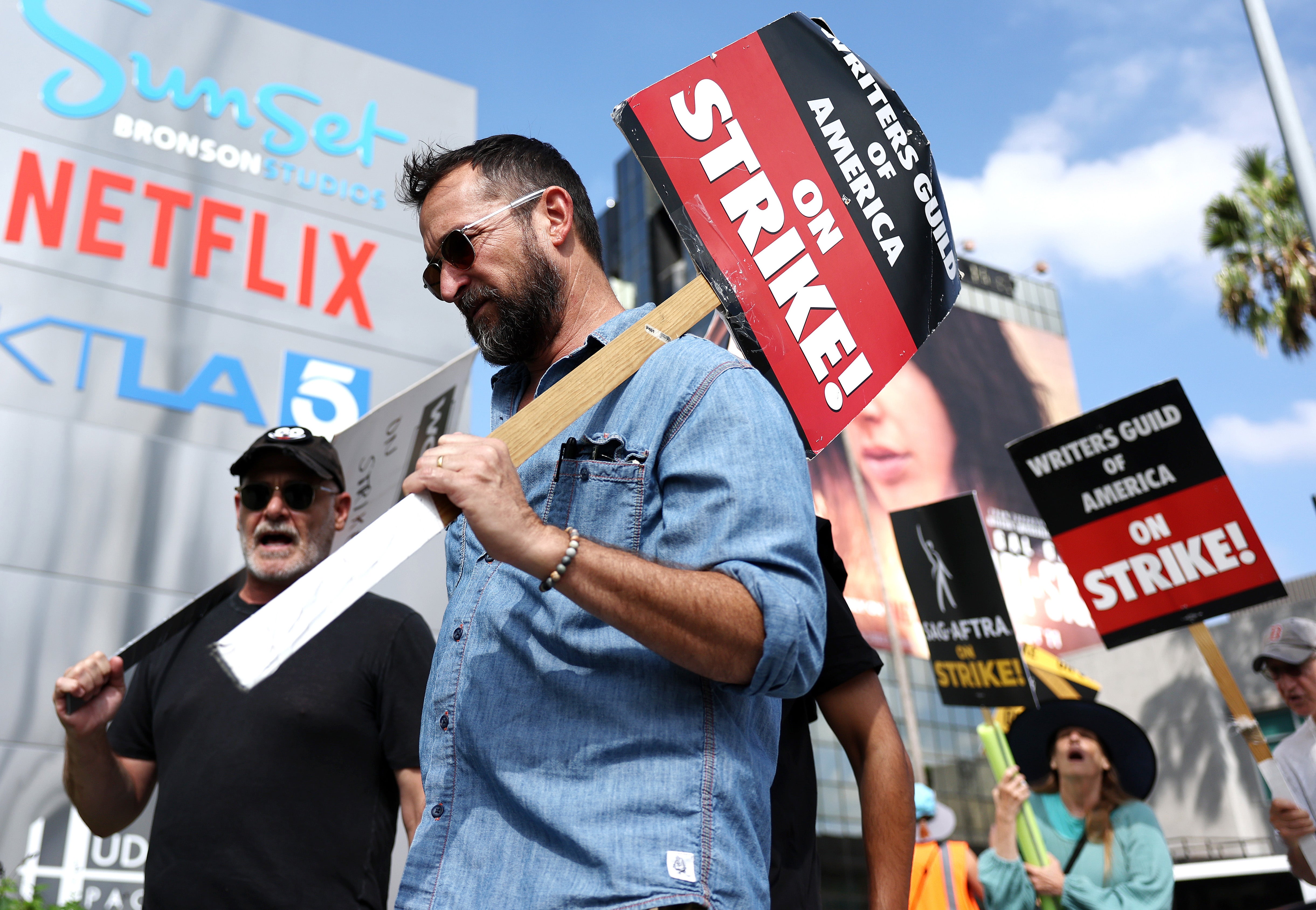 Writers picketing outside Netflix in California earlier this month