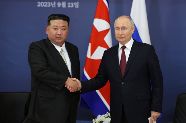 <p>Russian president Vladimir Putin and North Korea’s leader Kim Jong-un shake hands during their meeting at the Vostochny cosmodrome in September this year </p>