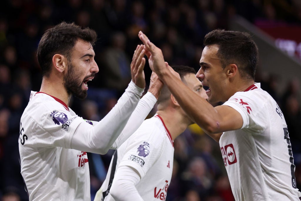 Reguilon celebrates with Fernandes after United’s winner