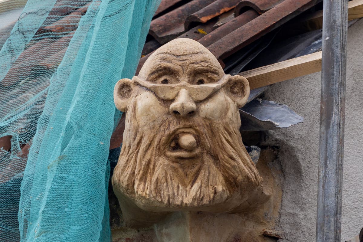 Angry builder erects gargoyle of council chief as planning row turns ugly