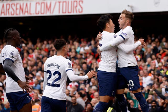 Son Heung-min celebrates with James Maddison during Tottenham’s 2-2 draw at Arsenal (David Cliff/AP/PA)