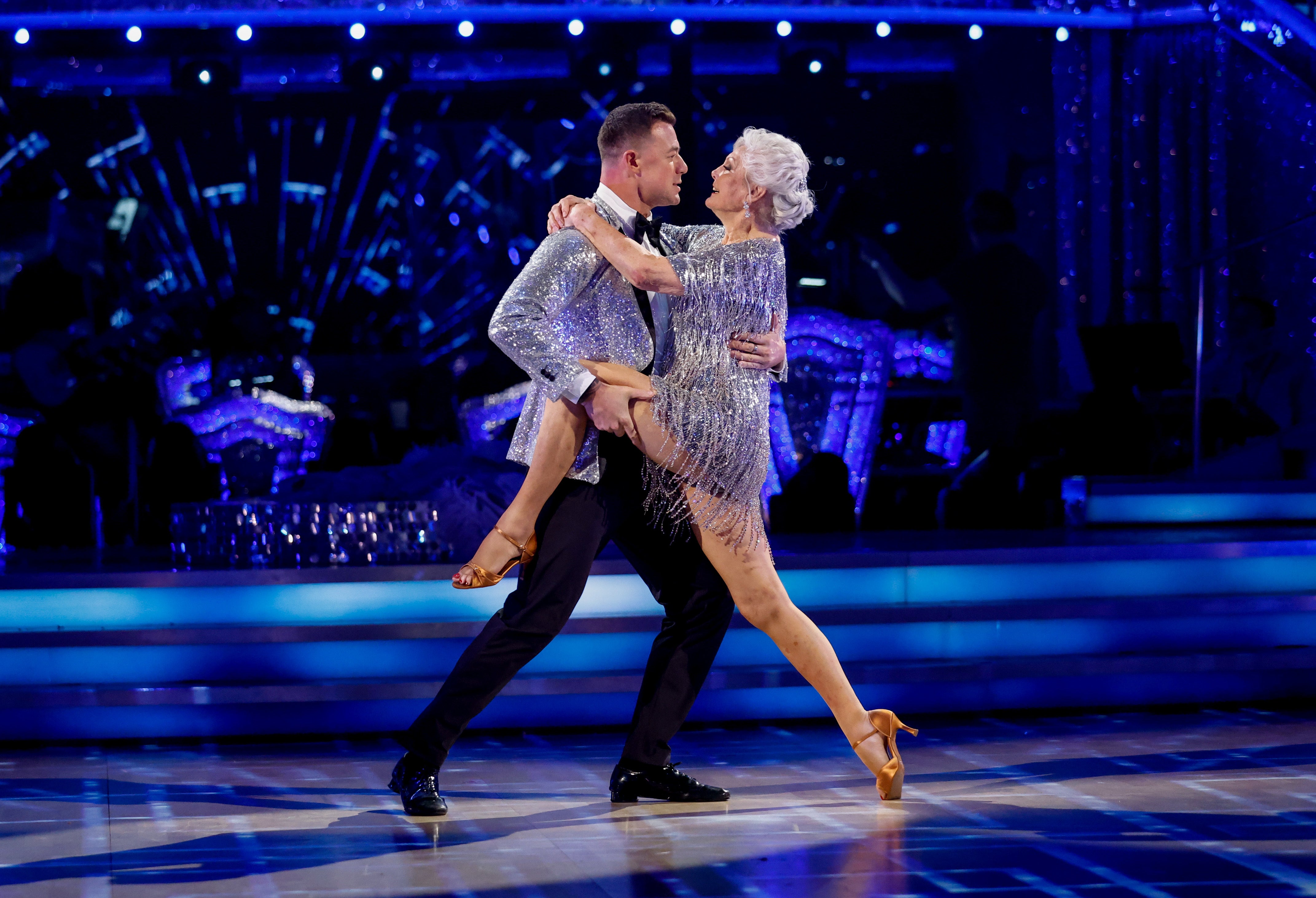 Angela Rippon and Kai Widdrington dance during the first live show