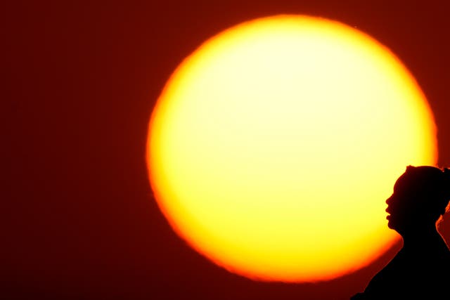 The sun’s energy will increase along with greater volcanic activity, making the Earth impossibly hot for people, the model suggests (Charlie Riedel/AP)