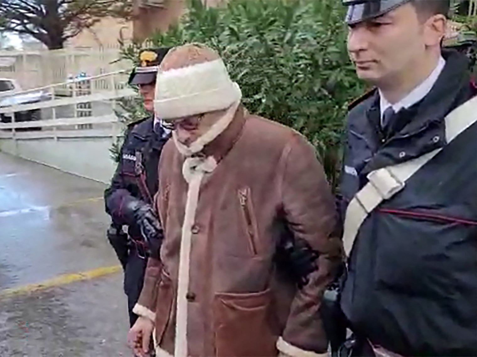 Matteo Messina Denaro being transferred into custody earlier this year